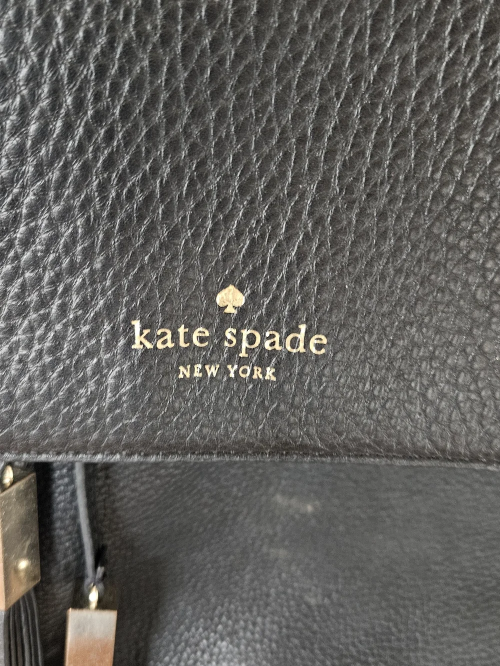 kate spade Black Pebbled Leather Backpack with Tassels